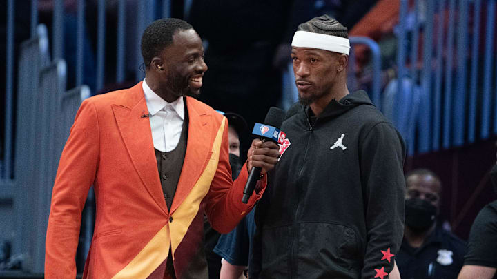 Draymond Green of the Golden State Warriors (23, left) interviews Team LeBron forward Jimmy Butler of the Miami Heat (22) during the fourth quarter in the 2022 NBA All-Star Game at Rocket Mortgage FieldHouse. Mandatory Credit: Kyle Terada-Imagn Images Draymond Green of the Golden State Warriors (23, left) interviews Team LeBron forward Jimmy Butler of the Miami Heat (22) during the fourth quarter in the 2022 NBA All-Star Game at Rocket Mortgage FieldHouse. Mandatory Credit: Kyle Terada-Imagn Images
