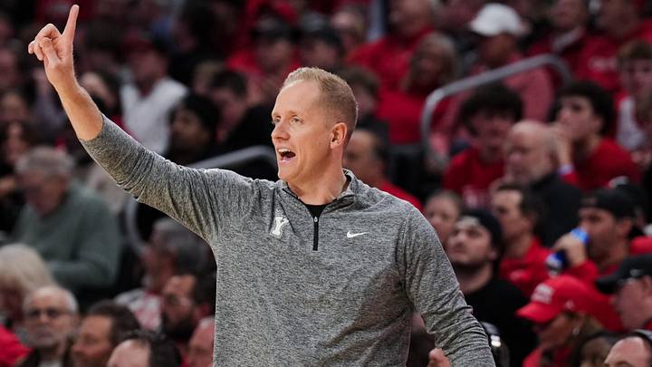 Mar 3, 2026; Cincinnati, Ohio, USA;  BYU Cougars head coach Kevin Young works the sideline against the Cincinnati Bearcats in the first half at Fifth Third Arena. Mandatory Credit: Aaron Doster-Imagn Images