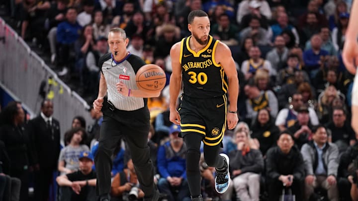 Golden State Warriors guard Stephen Curry (30) dribbles.