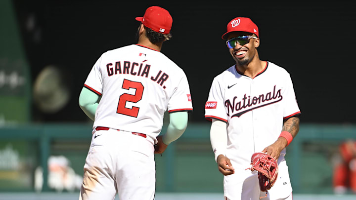Sep 3, 2025; Washington, District of Columbia, USA; Washington Nationals shortstop Nasim Nunez (26) celebrates with second baseman Luis Garcia Jr. (2) after the game against the Miami Marlins at Nationals Park. 
