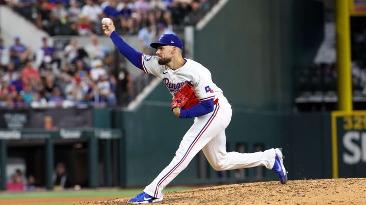 Jul 2, 2024; Arlington, Texas, USA;  Texas Rangers starting pitcher Nathan Eovaldi (17) throws during the seventh inning against the San Diego Padres at Globe Life Field. Mandatory Credit: Kevin Jairaj-USA TODAY Sports