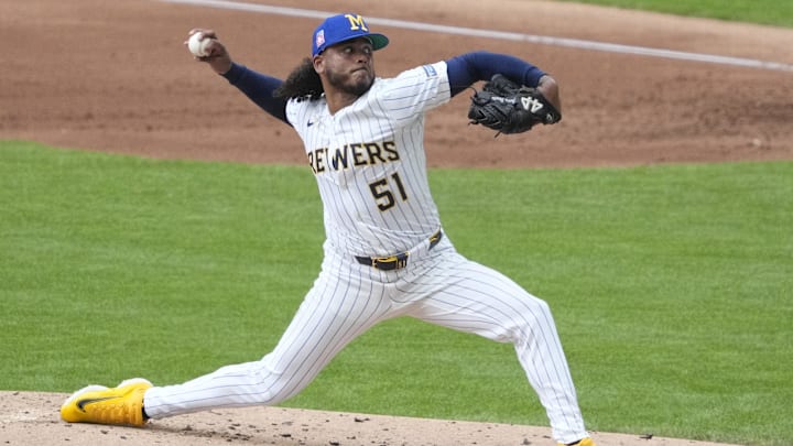 Jul 25, 2025; Milwaukee, Wisconsin, USA; Milwaukee Brewers pitcher Freddy Peralta (51) delivers a pitch against the Miami Marlins in the second inning at American Family Field. Mandatory Credit: Michael McLoone-Imagn Images