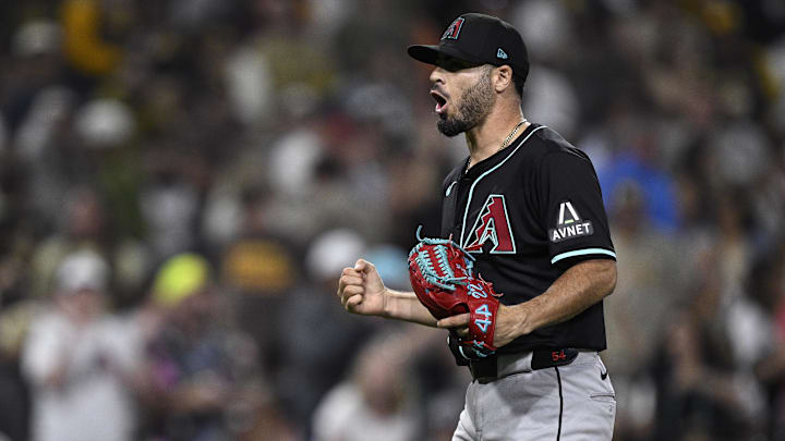 Jul 6, 2024; San Diego, California, USA; Arizona Diamondbacks relief pitcher Humberto Castellanos (54) celebrates on the field after defeating the San Diego Padres at Petco Park. Mandatory Credit: Orlando Ramirez-Imagn Images