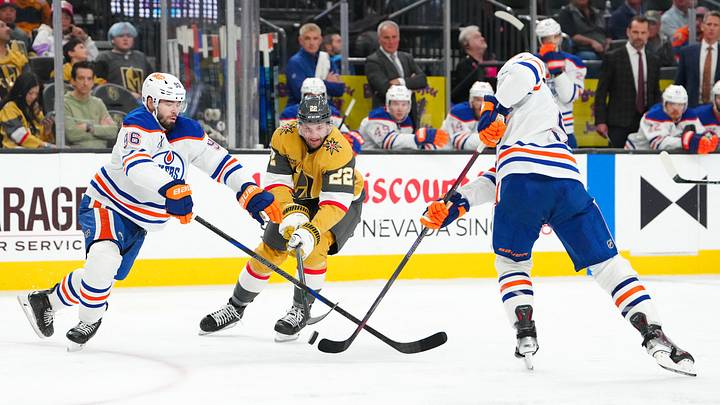 Mar 8, 2026; Las Vegas, Nevada, USA; Vegas Golden Knights right wing Cole Smith (22) skates between Edmonton Oilers defenseman Jake Walman (96) and defenseman Connor Murphy (5) during the third period at T-Mobile Arena. Mandatory Credit: Stephen R. Sylvanie-Imagn Images