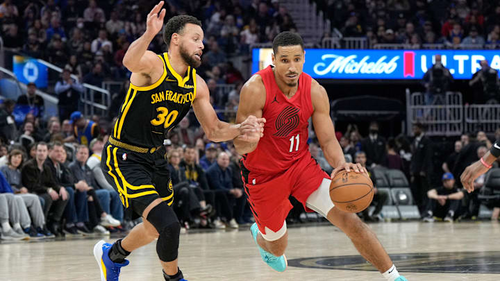 Stephen Curry, Golden State Warriors (left); Malcolm Brogdon, Portland Trail Blazers