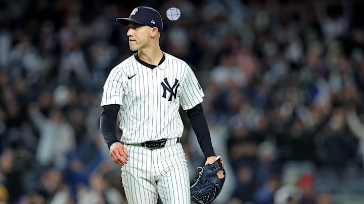 Oct 14, 2024; Bronx, New York, USA; New York Yankees pitcher Luke Weaver (30) celebrates after getting the last of game one of the ALCS for the 2024 MLB Playoffs against the Cleveland Guardians at Yankee Stadium. Mandatory Credit: Brad Penner-Imagn Images