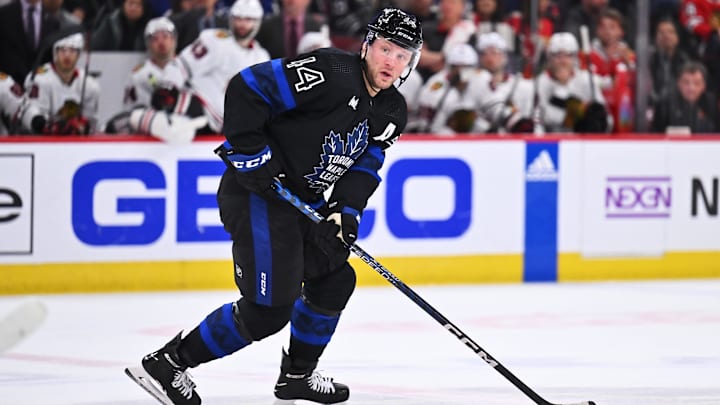 Feb 19, 2023; Chicago, Illinois, USA;  Toronto Maple Leafs defenseman Morgan Reilly (44) skates against the Chicago Blackhawks at United Center. Mandatory Credit: Jamie Sabau-Imagn Images