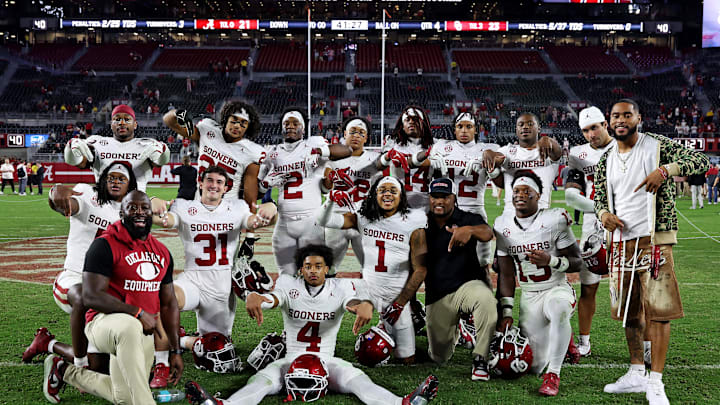Nov 15, 2025; Tuscaloosa, Alabama, USA;  The Oklahoma Sooners pose for a picture after defeating the Alabama Crimson Tide at Saban Field at Bryant-Denny Stadium. Mandatory Credit: David Leong-Imagn Images