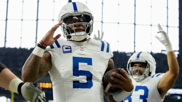 Indianapolis Colts quarterback Anthony Richardson (5) celebrates after rushing for a touchdown Sunday, Dec. 22, 2024, during a game against the Tennessee Titans at Lucas Oil Stadium in Indianapolis.