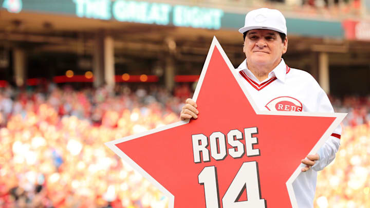Reds great Pete Rose holds a star bearing his name at Great American Ball Park in 2016.