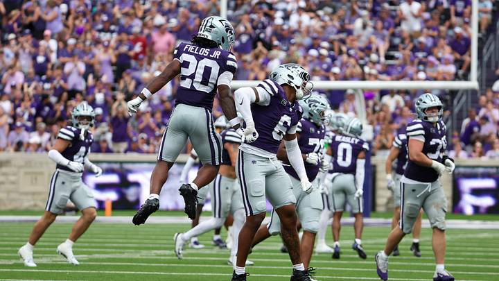 Sep 12, 2026; Manhattan, Kansas, USA; Kansas State Wildcats linebacker Darien Whitaker (6) and running back Rodney Fields Jr. (20) celebrate a defensive stop during the fourth quarter against the Washington State Cougars at Bill Snyder Family Football Stadium. Mandatory Credit: Scott Sewell-Imagn Images Sep 12, 2026; Manhattan, Kansas, USA; Kansas State Wildcats linebacker Darien Whitaker (6) and running back Rodney Fields Jr. (20) celebrate a defensive stop during the fourth quarter against the Washington State Cougars at Bill Snyder Family Football Stadium. Mandatory Credit: Scott Sewell-Imagn Images