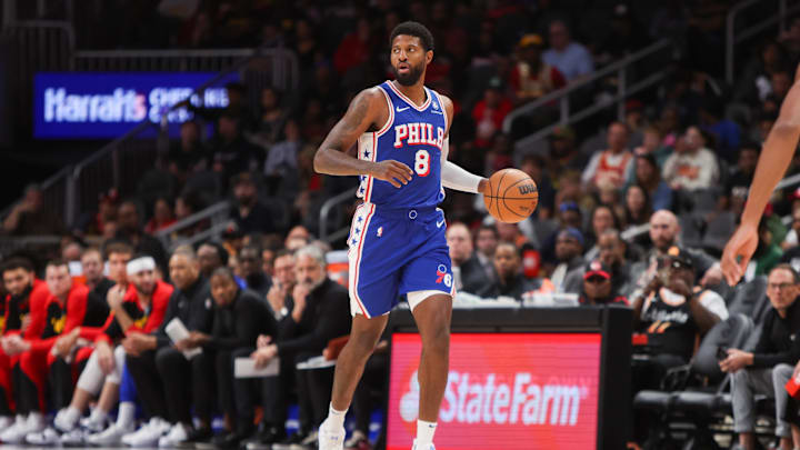 Oct 14, 2024; Atlanta, Georgia, USA; Philadelphia 76ers forward Paul George (8) dribbles against the Atlanta Hawks in the first quarter at State Farm Arena. Mandatory Credit: Brett Davis-Imagn Images Oct 14, 2024; Atlanta, Georgia, USA; Philadelphia 76ers forward Paul George (8) dribbles against the Atlanta Hawks in the first quarter at State Farm Arena. Mandatory Credit: Brett Davis-Imagn Images