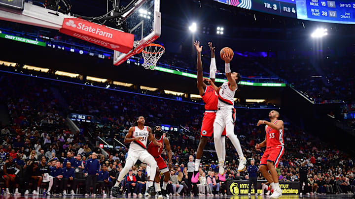 Dec 3, 2024; Inglewood, California, USA; Portland Trail Blazers guard Dalano Banton (5) shoots against Los Angeles Clippers center Mo Bamba (4) during the second half at Intuit Dome. Mandatory Credit: Gary A. Vasquez-Imagn Images Dec 3, 2024; Inglewood, California, USA; Portland Trail Blazers guard Dalano Banton (5) shoots against Los Angeles Clippers center Mo Bamba (4) during the second half at Intuit Dome. Mandatory Credit: Gary A. Vasquez-Imagn Images