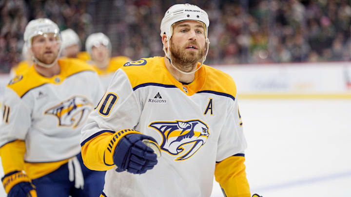 Dec 23, 2025; Saint Paul, Minnesota, USA; Nashville Predators center Ryan O'Reilly (90) leads the team to the bench after scoring against the Minnesota Wild in the first period at Grand Casino Arena. Mandatory Credit: Matt Blewett-Imagn Images