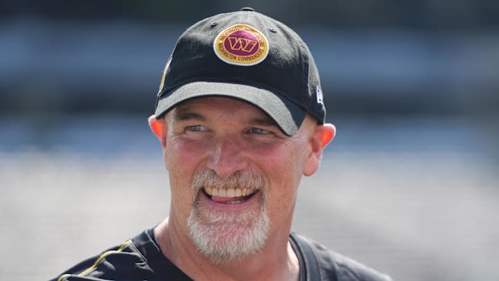 Aug 10, 2024; East Rutherford, New Jersey, USA; Washington Commanders head coach Dan Quinn smiles before the game against the New York Jets at MetLife Stadium. Mandatory Credit: Lucas Boland-Imagn Images