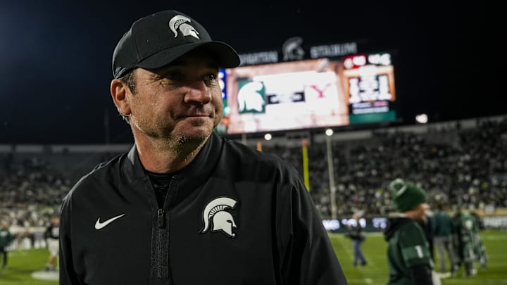Sep 6, 2025; East Lansing, Michigan, USA; Michigan State head coach Jonathan Smith walks across the field following  a double-overtime victory over Boston College at Spartan Stadium. Mandatory Credit: Brendan Mullin-Imagn Images