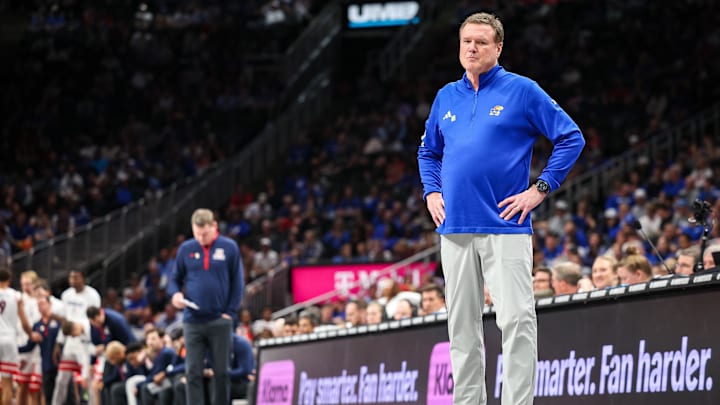 Mar 13, 2025; Kansas City, MO, USA; Kansas Jayhawks coach Bill Self watches game play during the first half against the Arizona Wildcats at T-Mobile Center. Mandatory Credit: William Purnell-Imagn Images