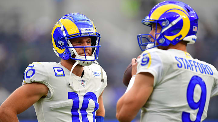 Sep 18, 2022; Inglewood, California, USA; Los Angeles Rams wide receiver Cooper Kupp (10) speaks with quarterback Matthew Stafford (9) before playing against the Atlanta Falcons at SoFi Stadium. Mandatory Credit: Gary A. Vasquez-Imagn Images