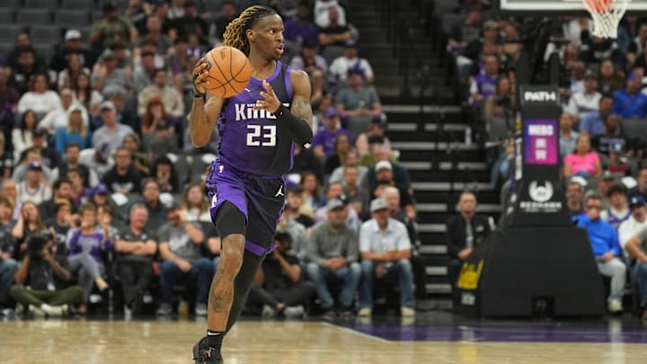 Apr 11, 2025; Sacramento, California, USA; Sacramento Kings guard Keon Ellis (23) handles the ball against the Los Angeles Clippers during the second quarter at Golden 1 Center. Mandatory Credit: Darren Yamashita-Imagn Images