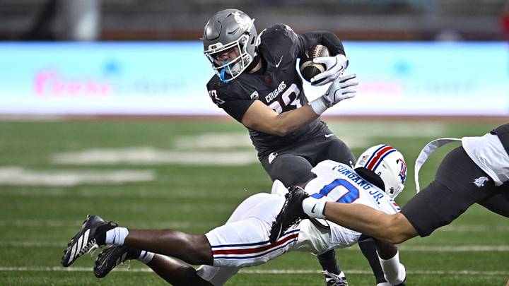 Washington State Cougars tight end Trey Leckner (23) is tackled by Louisiana Tech Bulldogs defensive back Sam Fongang (0) in the second half of a 2025 at Gesa Field at Martin Stadium. Washington State Cougars tight end Trey Leckner (23) is tackled by Louisiana Tech Bulldogs defensive back Sam Fongang (0) in the second half of a 2025 at Gesa Field at Martin Stadium.