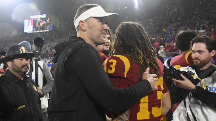 Nov 23, 2024; Pasadena, California, USA; USC Trojans head coach Lincoln Riley smiles after Trojans defeat the UCLA Bruins at Rose Bowl. Mandatory Credit: Robert Hanashiro-Imagn Images