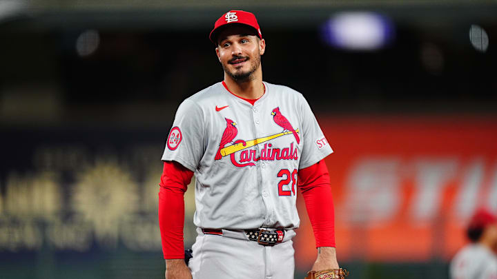 Sep 25, 2024; Denver, Colorado, USA; St. Louis Cardinals third base Nolan Arenado (28) reacts in the third inning against the Colorado Rockies at Coors Field. Mandatory Credit: Ron Chenoy-Imagn Images