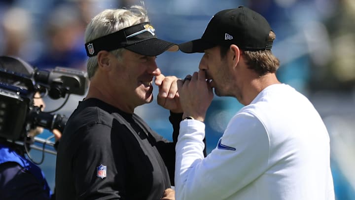Jacksonville Jaguars head coach Doug Pederson, left, and Indianapolis Colts head coach Shane Steichen talk before an NFL football matchup Sunday, Oct. 15, 2023 at EverBank Stadium in Jacksonville, Fla. [Corey Perrine/Florida Times-Union]