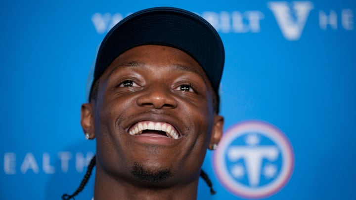 Tennessee Titans first round draft pick wide receiver Carnell Tate, 4th overall pick, stands for a portrait at Vanderbilt Health Football Center Friday, April 24, 2026. Tennessee Titans first round draft pick wide receiver Carnell Tate, 4th overall pick, stands for a portrait at Vanderbilt Health Football Center Friday, April 24, 2026.