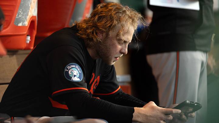 Aug 29, 2026; West Sacramento, California, USA;  Baltimore Orioles starting pitcher Shane Baz (34) checks his performance against the Athletics on a tablet during the second inning at Sutter Health Park.  Mandatory Credit: D. Ross Cameron-Imagn Images