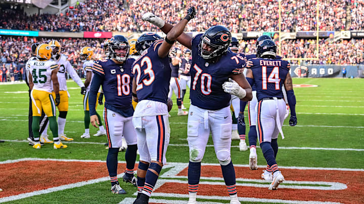 Bears tackle Braxton Jones celebrates with Roschon Johnson against the Packers. Jones' job and the running back situation are uncertainties for next season says GM Ryan Poles. Bears tackle Braxton Jones celebrates with Roschon Johnson against the Packers. Jones' job and the running back situation are uncertainties for next season says GM Ryan Poles.