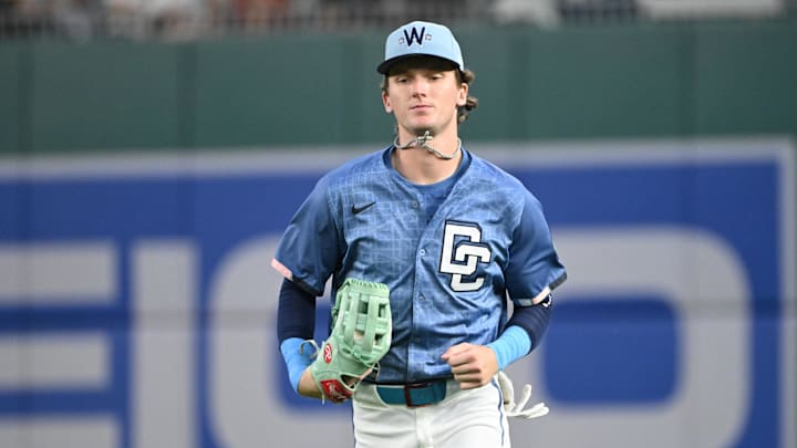 Jun 6, 2025; Washington, District of Columbia, USA; Washington Nationals center fielder Robert Hassell III (57) jobs back to the dugout during the eighth inning against the Texas Rangers at Nationals Park. Jun 6, 2025; Washington, District of Columbia, USA; Washington Nationals center fielder Robert Hassell III (57) jobs back to the dugout during the eighth inning against the Texas Rangers at Nationals Park.
