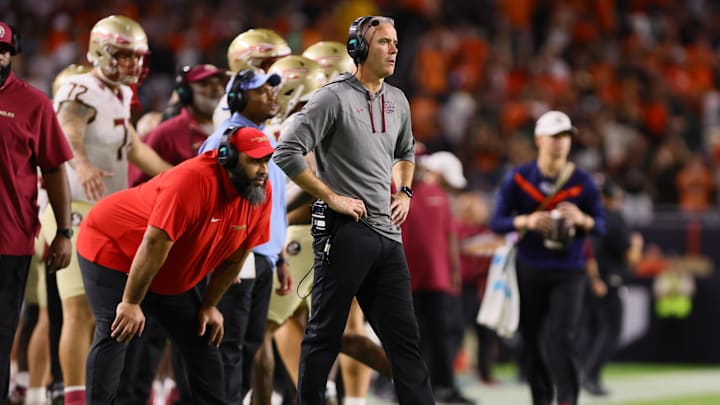 Oct 26, 2024; Miami Gardens, Florida, USA; Florida State Seminoles head coach Mike Norvell watches from the sideline against the Miami Hurricanes during the second quarter at Hard Rock Stadium. Mandatory Credit: Sam Navarro-Imagn Images Oct 26, 2024; Miami Gardens, Florida, USA; Florida State Seminoles head coach Mike Norvell watches from the sideline against the Miami Hurricanes during the second quarter at Hard Rock Stadium. Mandatory Credit: Sam Navarro-Imagn Images