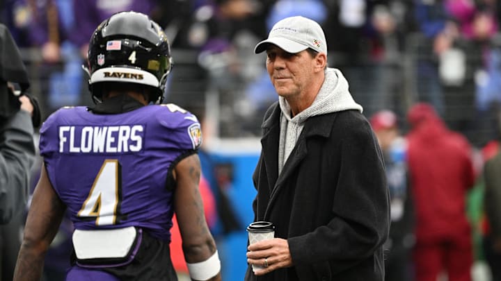 Jan 28, 2024; Baltimore, Maryland, USA; Baltimore Ravens ower Steve Bisciotti (right) talks with Baltimore Ravens wide receiver Zay Flowers (4) prior to the AFC Championship football game against the Kansas City Chiefs at M&T Bank Stadium. Mandatory Credit: Tommy Gilligan-Imagn Images