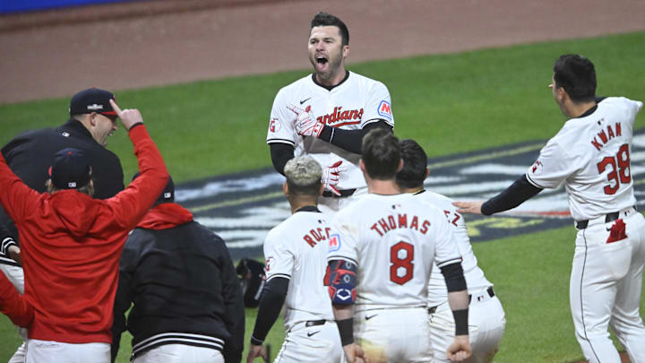 Fry celebrates with teammates after smacking a game-winning homer in the bottom of the 10th inning.