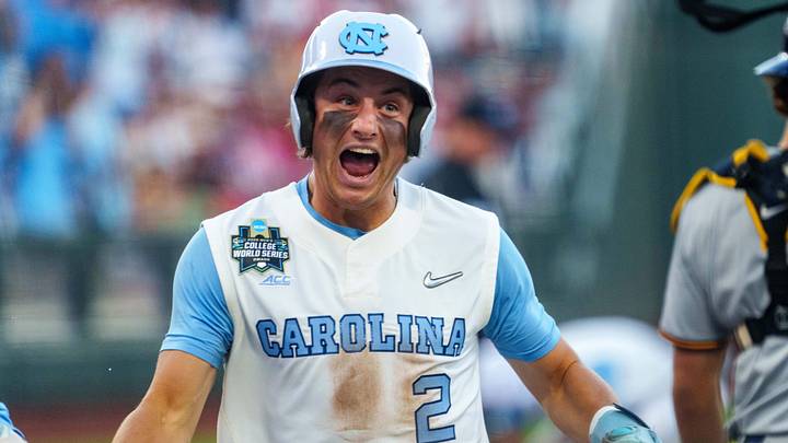 Jun 14, 2026; Omaha, NE, USA; North Carolina Tar Heels shortstop Jake Schaffner (2) reacts after scoring on a two-run triple by second baseman Gavin Gallaher (not pictured) against the West Virginia Mountaineers during the seventh inning at Charles Schwab Field. Mandatory Credit: Dylan Widger-Imagn Images