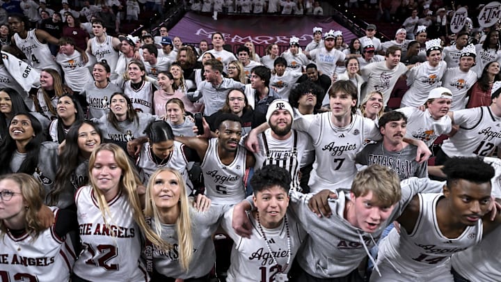Jan 21, 2026; College Station, Texas, USA; Texas A&M Aggies guard Jacari Lane (5), forward Zach Clemence (7), forward Chris McDermott (14), forward Jamie Vinson (4), guard Ruben Dominguez (9) celebrate in the student section after the win over Mississippi State Bulldogs at Reed Arena. Mandatory Credit: Maria Lysaker-Imagn Images 