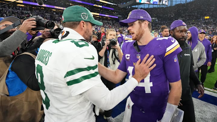 Oct 6, 2024; London, United Kingdom; New York Jets quarterback Aaron Rodgers (8) shakes hands with Minnesota Vikings quarterback Sam Darnold (14) after the game at Tottenham Hotspur Stadium. Mandatory Credit: Kirby Lee-Imagn Images Oct 6, 2024; London, United Kingdom; New York Jets quarterback Aaron Rodgers (8) shakes hands with Minnesota Vikings quarterback Sam Darnold (14) after the game at Tottenham Hotspur Stadium. Mandatory Credit: Kirby Lee-Imagn Images