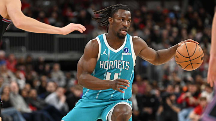 Jan 3, 2026; Chicago, Illinois, USA; Charlotte Hornets guard Sion James (4) controls the ball against the Chicago Bulls during the first half at United Center. Mandatory Credit: Patrick Gorski-Imagn Images Jan 3, 2026; Chicago, Illinois, USA; Charlotte Hornets guard Sion James (4) controls the ball against the Chicago Bulls during the first half at United Center. Mandatory Credit: Patrick Gorski-Imagn Images