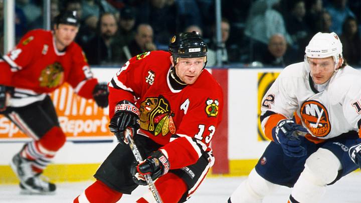 Jan 9, 2001; Uniondale, NY, USA; FILE PHOTO; Chicago Blackhawks center Alex Zhamnov (13) in action against New York Islanders center Oleg Kvasha (12) at Nassau Coliseum. Mandatory Credit: Lou Capozzola-USA TODAY NETWORK