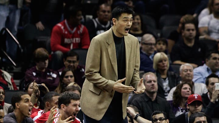 Nov 6, 2010; San Antonio, TX, USA; Houston Rockets center Yao Ming (11) reacts to a call from the bench during the game against San Antonio Spurs at the AT&T Center. Spurs win in overtime 124-121. Mandatory Credit: Soobum Im-Imagn Images