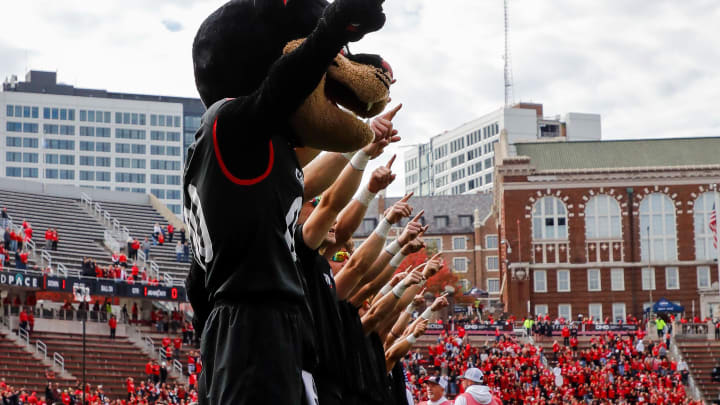 Oct 21, 2023; Cincinnati, Ohio, USA; The Cincinnati Bearcats mascot points to the sky during the playing of the alma mater before the game against the Baylor Bears at Nippert Stadium. Mandatory Credit: Katie Stratman-USA TODAY Sports