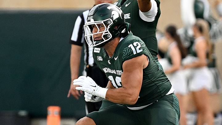 Sep 12, 2026; East Lansing, Michigan, USA; Michigan State Spartans quarterback Cam Fancher (2) passes the ball while being protected by Michigan State Spartans tight end Carson Gulker (12) during the fourth quarter against the Eastern Michigan Eagles at Spartan Stadium. Mandatory Credit: Dale Young-Imagn Images Sep 12, 2026; East Lansing, Michigan, USA; Michigan State Spartans quarterback Cam Fancher (2) passes the ball while being protected by Michigan State Spartans tight end Carson Gulker (12) during the fourth quarter against the Eastern Michigan Eagles at Spartan Stadium. Mandatory Credit: Dale Young-Imagn Images