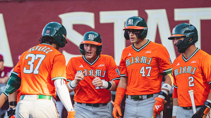 MIami Hurricanes players after Alonzo Alveraz hits a home run
