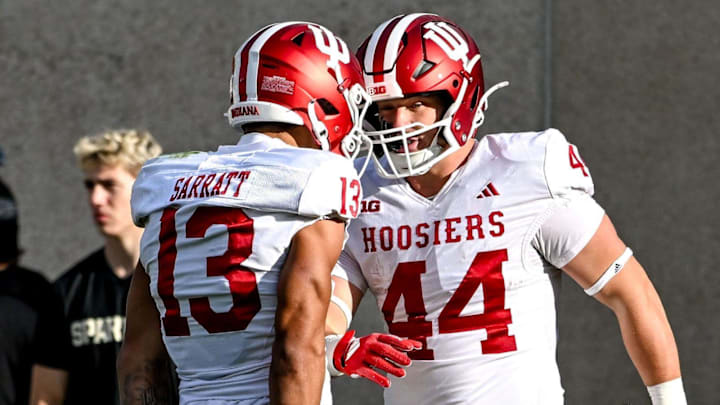 Indiana's Zach Horton celebrates his touchdown with Elijah Sarratt at Spartan Stadium.