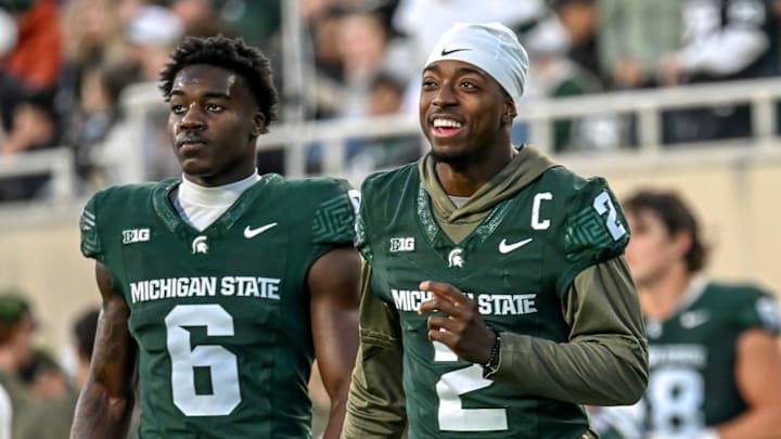 Michigan State's Aidan Chiles, right, and Nick Marsh walk to the locker room at halftime in the game against Penn State during the second quarter on Saturday, Nov. 15, 2025, at Spartan Stadium in East Lansing.
