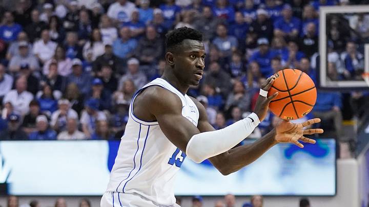 Mar 7, 2026; Provo, Utah, USA; BYU Cougars forward Keba Keita (13) passes the ball during the first half against the Texas Tech Red Raiders at Marriott Center. Mandatory Credit: Aaron Baker-Imagn Images