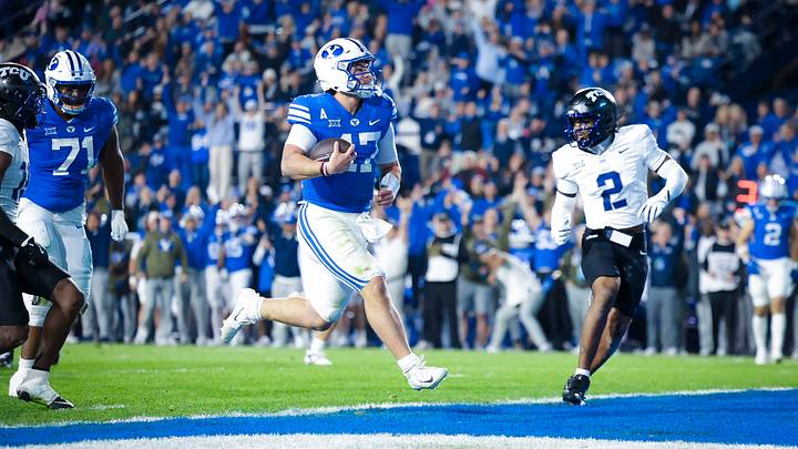 BYU quarterback Bear Bachmeier scores a touchdown against TCU BYU quarterback Bear Bachmeier scores a touchdown against TCU
