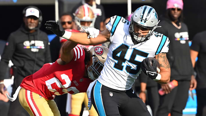 Oct 9, 2022; Charlotte, North Carolina, USA; Carolina Panthers fullback Giovanni Ricci (45) with the ball as San Francisco 49ers safety Talanoa Hufanga (29) defends in the second quarter at Bank of America Stadium.