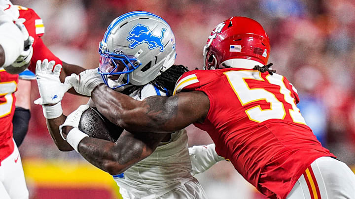 Detroit Lions running back Jahmyr Gibbs (0) runs against Kansas City Chiefs defensive end Mike Danna (51) during the first half at Arrowhead Stadium in Kansas City, Missouri on Sunday, Oct. 12, 2025. Detroit Lions running back Jahmyr Gibbs (0) runs against Kansas City Chiefs defensive end Mike Danna (51) during the first half at Arrowhead Stadium in Kansas City, Missouri on Sunday, Oct. 12, 2025.