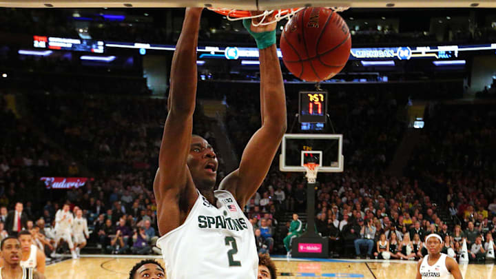 Mar 3, 2018; New York, NY, USA; Michigan State Spartans forward Jaren Jackson Jr. (2) dunks over Michigan Wolverines guard Jordan Poole (2) during the first half of a semifinal game of the 2018 Big Ten Tournament at Madison Square Garden. Mandatory Credit: Brad Penner-Imagn Images